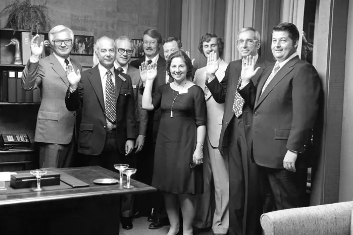 A group of employees pose in the branch when it first opened in 1975.